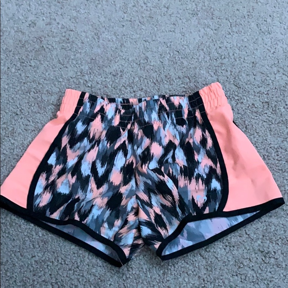 shorts with black white orange and gray pattern